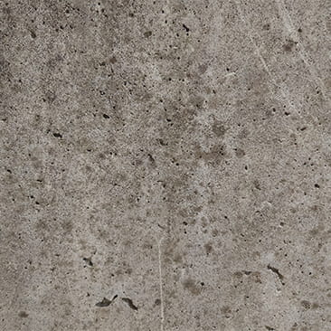 排気ガスなどの汚れついて黒くなったコンクリート